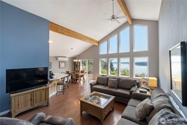 11011 Seaview Dr, Anderson Island, WA 98303 - living area with beam ceiling, a wall unit AC, a water view, dark wood-type flooring, and a ceiling fan