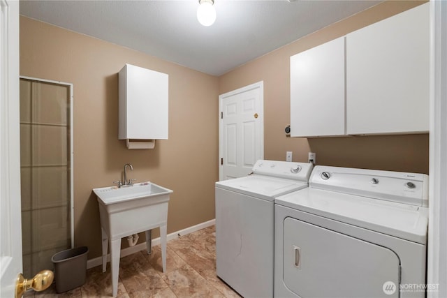 11011 Seaview Dr, Anderson Island, WA 98303 - clothes washing area featuring cabinet space, independent washer and dryer, and baseboards