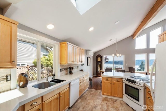 11011 Seaview Dr, Anderson Island, WA 98303 - kitchen featuring white appliances, a wall unit AC, a sink, a chandelier, and tasteful backsplash