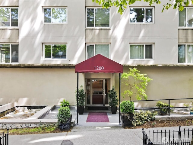 1200 Boylston Ave Unit 301, Seattle, WA 98101 - entrance to property featuring stucco siding and fence