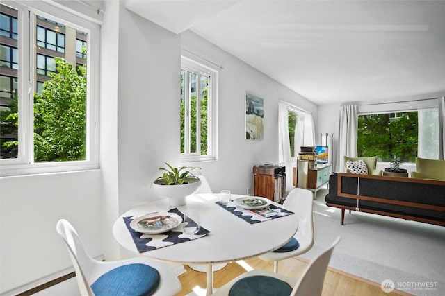 1200 Boylston Ave Unit 301, Seattle, WA 98101 - dining area featuring wood finished floors
