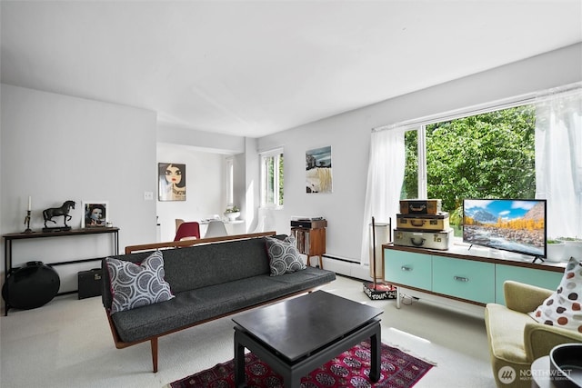 1200 Boylston Ave Unit 301, Seattle, WA 98101 - living area with a baseboard heating unit and light colored carpet