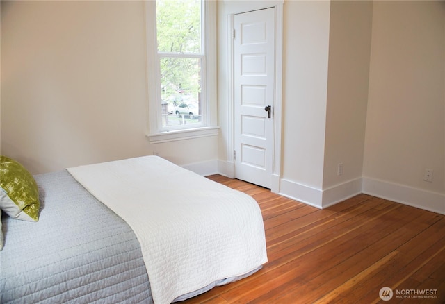 123 24th Ave, Seattle, WA 98122 - bedroom featuring wood finished floors and baseboards