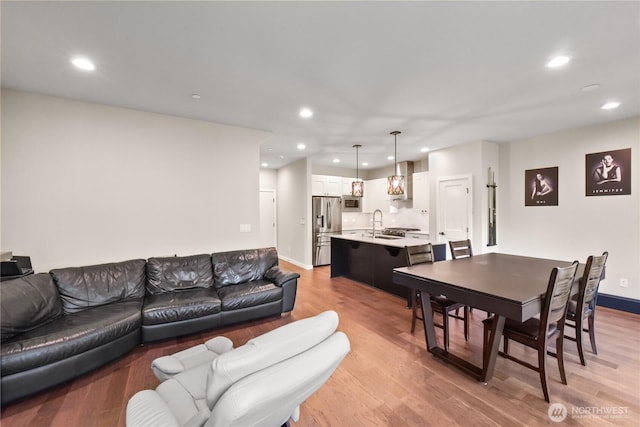 1086 Collier Pl SW, Issaquah, WA 98027 - living room featuring recessed lighting, light wood-type flooring, and baseboards