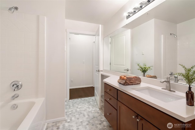 21450 40th Pl S Unit A, Seatac, WA 98198 - bathroom featuring vanity, baseboards, and shower / bath combination