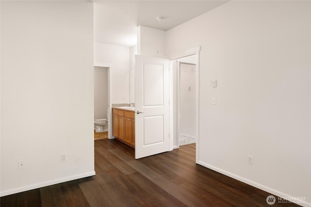 21450 40th Pl S Unit A, Seatac, WA 98198 - spare room with a sink, dark wood finished floors, baseboards, and a smoke detector