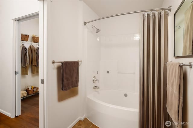 21450 40th Pl S Unit A, Seatac, WA 98198 - bathroom featuring shower / tub combo and baseboards