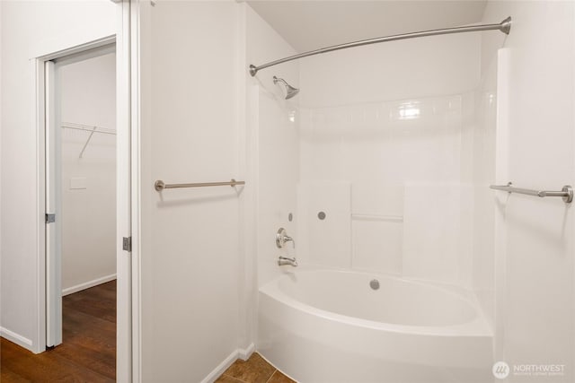 21450 40th Pl S Unit A, Seatac, WA 98198 - full bathroom with baseboards, shower / tub combination, and wood finished floors
