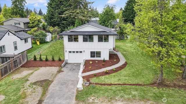 1246 SW 148th St, Burien, WA 98166 - view of front of property featuring driveway, board and batten siding, a garage, and roof with shingles