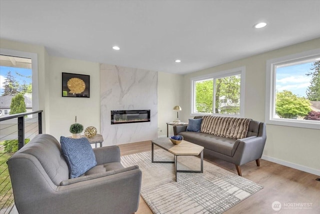 1246 SW 148th St, Burien, WA 98166 - living room featuring wood finished floors, recessed lighting, a premium fireplace, and baseboards