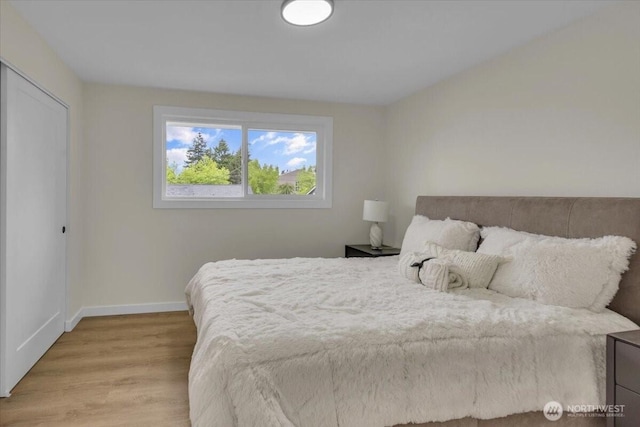 1246 SW 148th St, Burien, WA 98166 - bedroom with light wood-style floors and baseboards