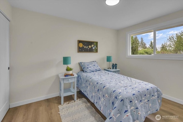 1246 SW 148th St, Burien, WA 98166 - bedroom featuring baseboards and wood finished floors