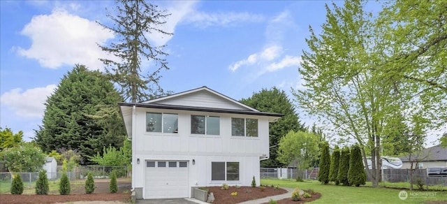 1246 SW 148th St, Burien, WA 98166 - view of front facade featuring board and batten siding, a garage, and driveway