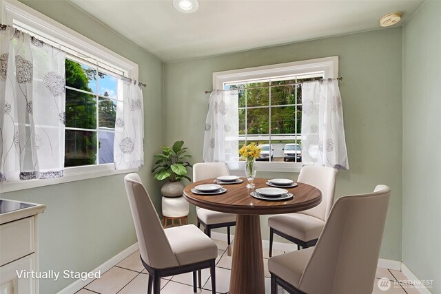 414 W Wyandotte Ave, Shelton, WA 98584 - dining space with light tile patterned flooring and baseboards