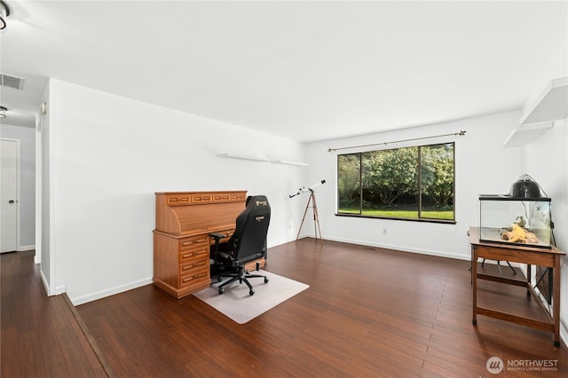 office space featuring wood finished floors and baseboards