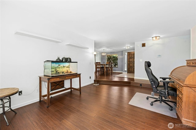 office area featuring wood finished floors and baseboards