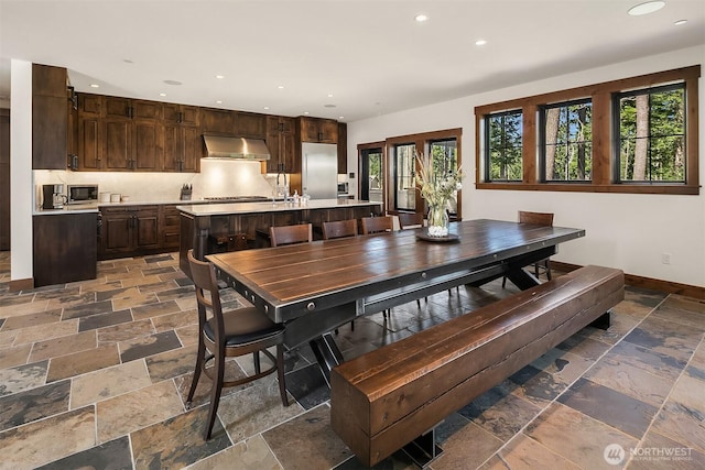 350 Kings Ct, Cle Elum, WA 98922 - dining room featuring stone tile flooring, recessed lighting, and baseboards