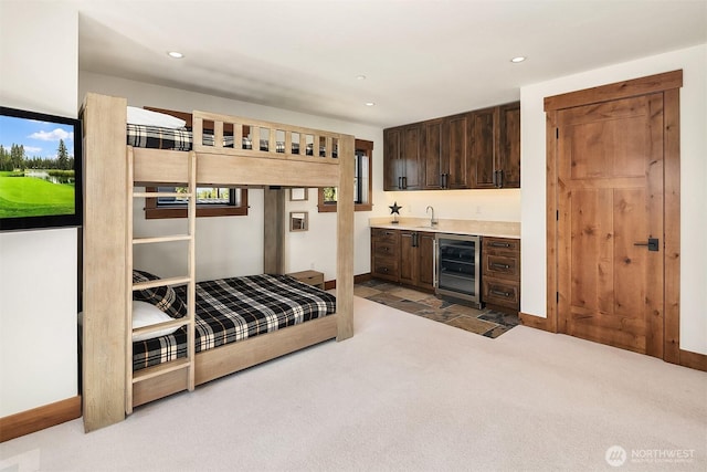 350 Kings Ct, Cle Elum, WA 98922 - carpeted bedroom with beverage cooler, wet bar, recessed lighting, and baseboards