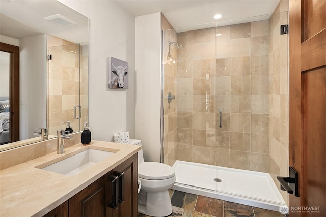 350 Kings Ct, Cle Elum, WA 98922 - bathroom with a shower stall, toilet, vanity, and recessed lighting