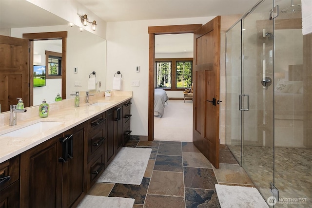350 Kings Ct, Cle Elum, WA 98922 - full bathroom featuring ensuite bath, a shower stall, stone tile flooring, and double vanity