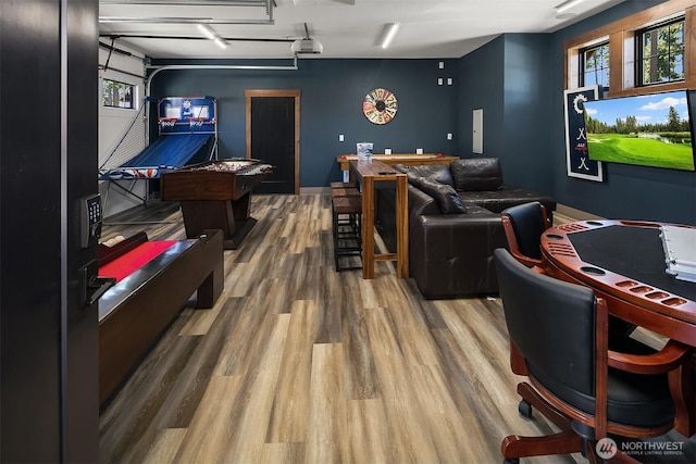 350 Kings Ct, Cle Elum, WA 98922 - game room featuring a garage, plenty of natural light, and wood finished floors