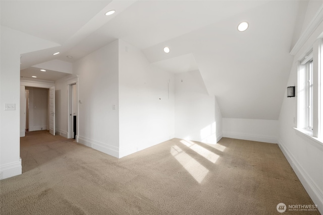 additional living space with recessed lighting, carpet floors, and baseboards