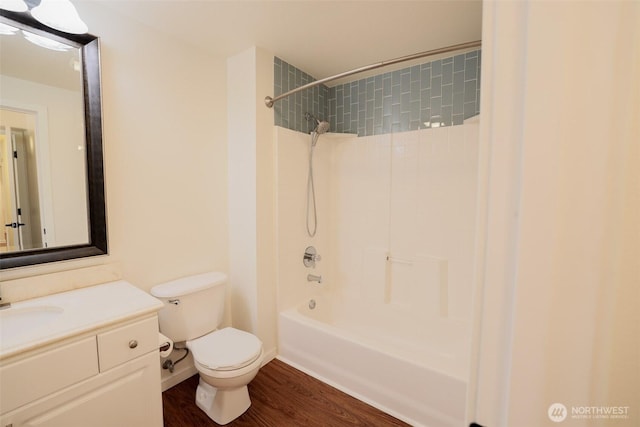 18621 Blueberry Ln Unit B206, Monroe, WA 98272 - bathroom featuring toilet, wood finished floors, vanity, and shower / bathtub combination