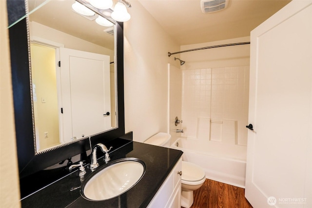 18621 Blueberry Ln Unit B206, Monroe, WA 98272 - full bath with toilet, vanity, wood finished floors, and bathing tub / shower combination