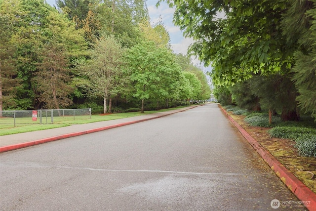 18621 Blueberry Ln Unit B206, Monroe, WA 98272 - view of community with fence and a game area