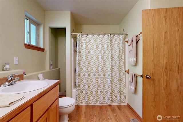 18 Blue Creek Rd, Walla Walla, WA 99362 - bathroom featuring wood finished floors, toilet, shower / tub combo with curtain, and vanity
