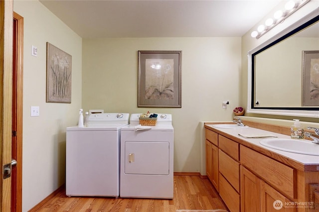 18 Blue Creek Rd, Walla Walla, WA 99362 - laundry area featuring washing machine and clothes dryer, light wood-style flooring, and baseboards