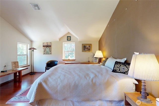 18 Blue Creek Rd, Walla Walla, WA 99362 - bedroom with wood finished floors, multiple windows, vaulted ceiling, and baseboards