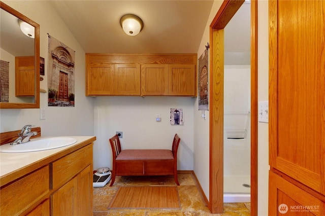 18 Blue Creek Rd, Walla Walla, WA 99362 - bathroom featuring a stall shower, vanity, and stone finish flooring