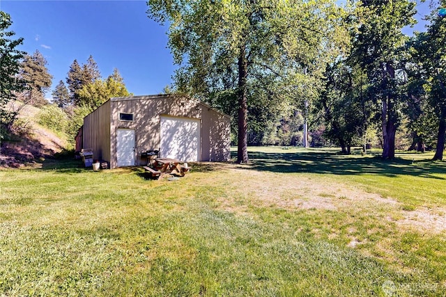 18 Blue Creek Rd, Walla Walla, WA 99362 - view of grassy yard with a garage and an outdoor structure