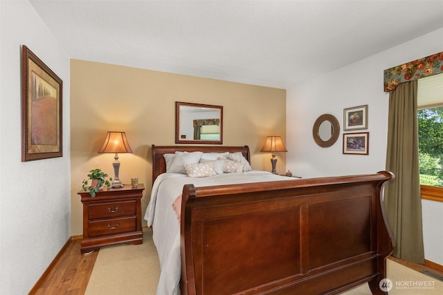 55771 Mossyrock Ave, Mossyrock, WA 98564 - bedroom with baseboards and light wood-style floors
