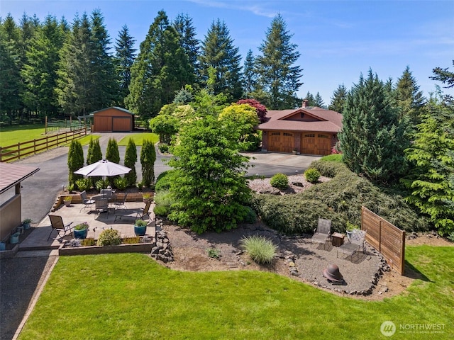 55771 Mossyrock Ave, Mossyrock, WA 98564 - view of yard featuring an outbuilding and a patio