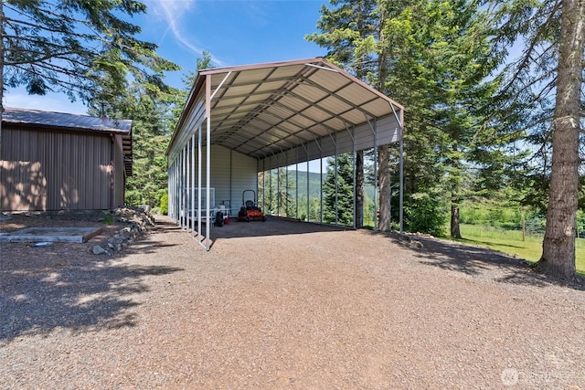 55771 Mossyrock Ave, Mossyrock, WA 98564 - view of vehicle parking featuring dirt driveway and a carport