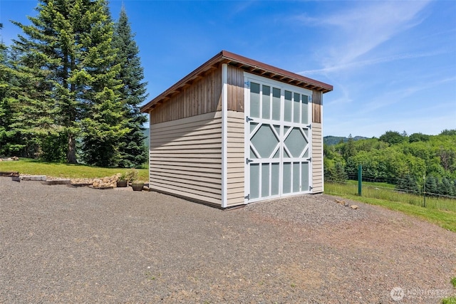 55771 Mossyrock Ave, Mossyrock, WA 98564 - view of shed with a wooded view