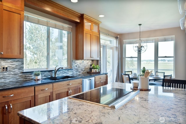 746 Van Dyk Rd, Lynden, WA 98264 - kitchen featuring black electric stovetop, a sink, backsplash, dark stone counters, and recessed lighting
