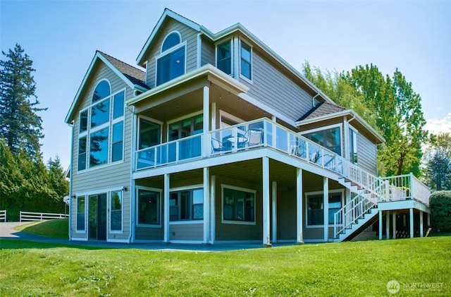 746 Van Dyk Rd, Lynden, WA 98264 - rear view of house with a wooden deck and stairs