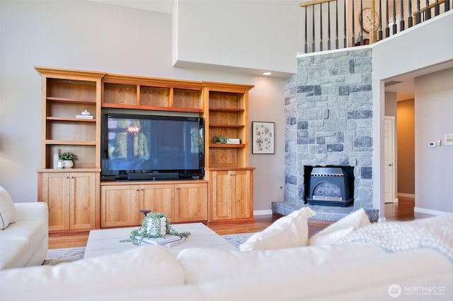 746 Van Dyk Rd, Lynden, WA 98264 - living room featuring a towering ceiling, baseboards, and light wood-type flooring