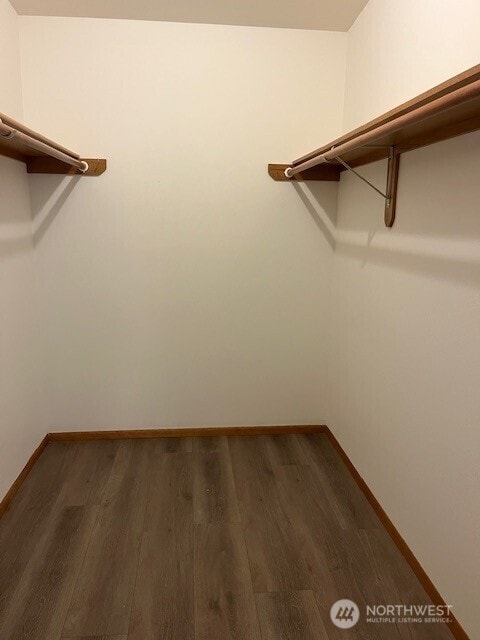 434 SE Stanford Pl, College Place, WA 99324 - walk in closet with dark wood-type flooring
