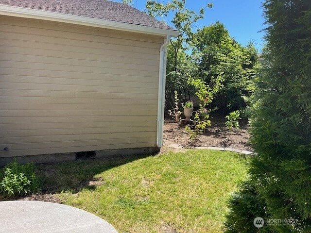434 SE Stanford Pl, College Place, WA 99324 - view of property exterior featuring a lawn and roof with shingles
