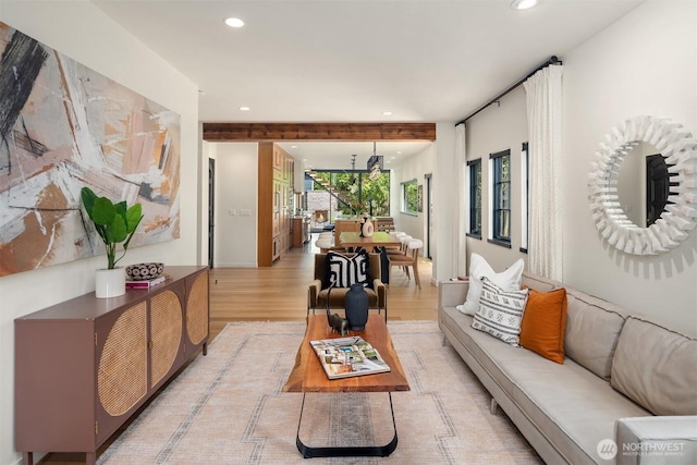 living area featuring recessed lighting and light wood-style floors