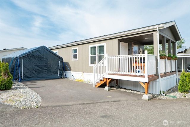 1200 Lincoln St Unit 121, Bellingham, WA 98229 - manufactured / mobile home with a porch