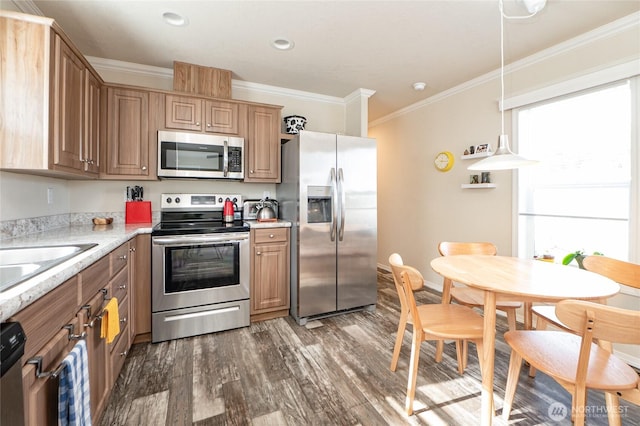 1200 Lincoln St Unit 121, Bellingham, WA 98229 - kitchen with appliances with stainless steel finishes, dark wood finished floors, crown molding, light countertops, and a sink