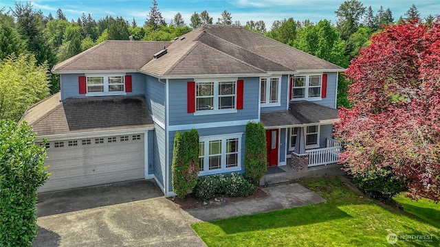 27922 146th Ave SE, Kent, WA 98042 - traditional-style house featuring covered porch, driveway, a front lawn, and roof with shingles