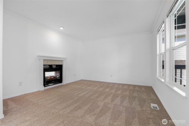 27922 146th Ave SE, Kent, WA 98042 - unfurnished living room featuring carpet, a tile fireplace, crown molding, and baseboards