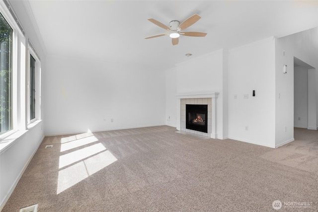 27922 146th Ave SE, Kent, WA 98042 - unfurnished living room with carpet, a ceiling fan, a tile fireplace, and baseboards