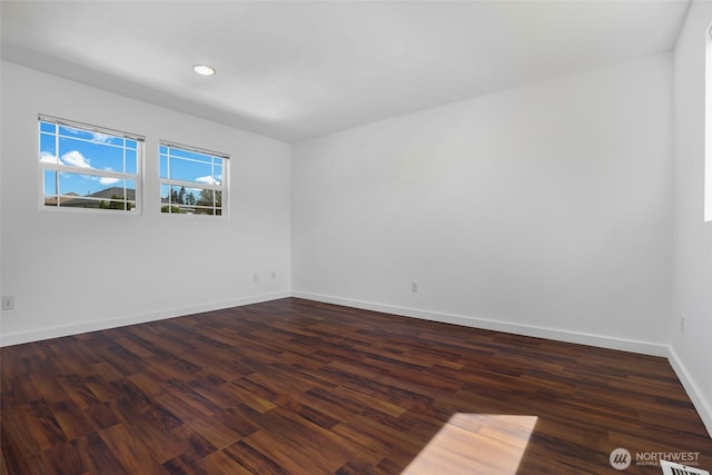 27922 146th Ave SE, Kent, WA 98042 - empty room with dark wood-style flooring, baseboards, and recessed lighting